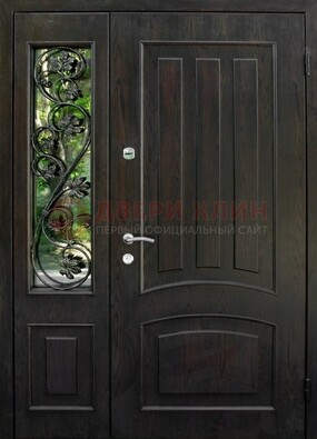 Парадная дверь со стеклянными вставками и ковкой ДПР-31 в кирпичный дом в Тольятти
