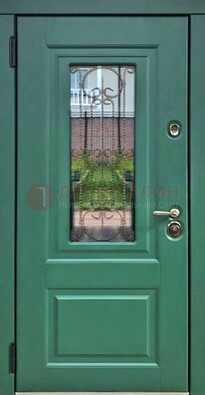 Зеленая металлическая дверь со стеклом и ковкой ДСК-113 в Тольятти